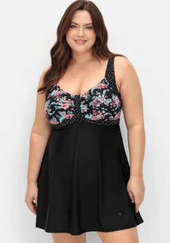 Badekleid im Mustermix mit integrierter Hose