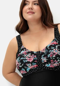 Badekleid im Mustermix mit integrierter Hose