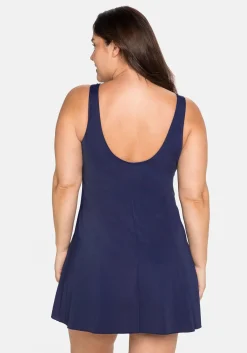 Badekleid mit V-Ausschnitt und integrierter Hose.