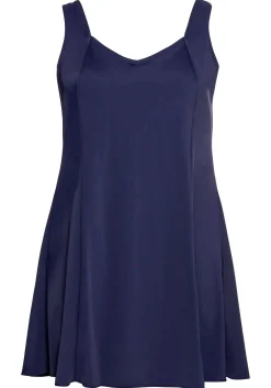 Badekleid mit V-Ausschnitt und integrierter Hose.