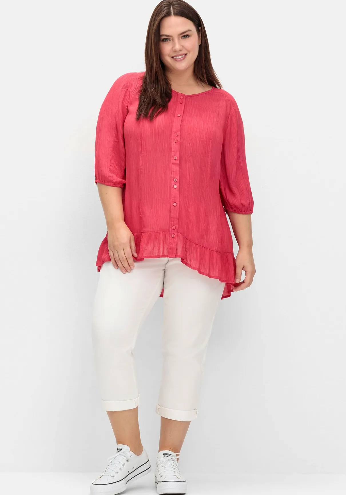 Bluse aus Crêpe, mit Volants am Saum