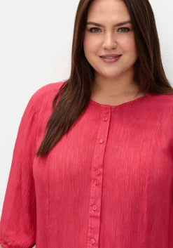 Bluse aus Crêpe, mit Volants am Saum