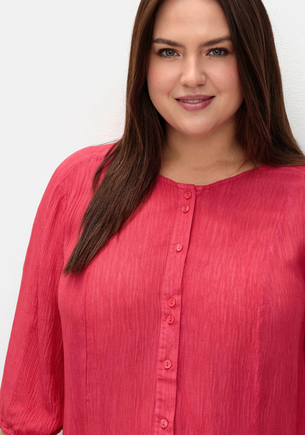 Bluse aus Crêpe, mit Volants am Saum