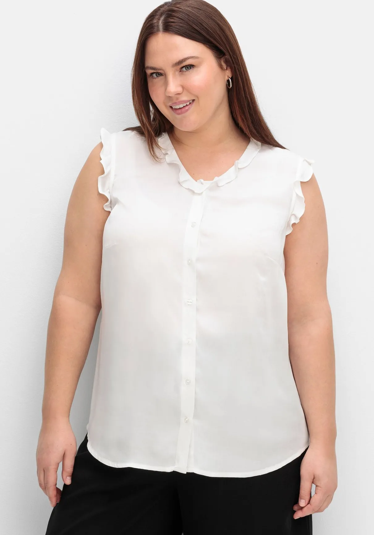 Bluse in ärmelloser Form mit Volants, aus Viskose