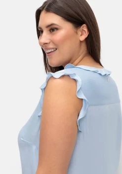 Bluse in ärmelloser Form mit Volants, aus Viskose