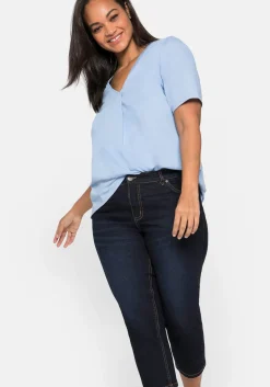 Caprijeans mit Kontrastnähten und Catfaces