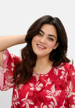 Chiffontunika mit Blütenprint und Flügelärmeln