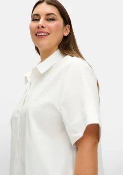 Hemdbluse mit Zipfelsaum und weiten Ärmeln