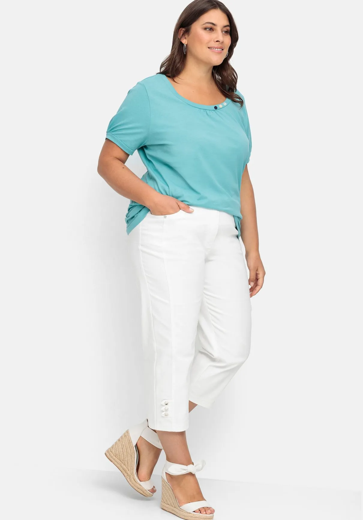 7/8-Jeans mit Zierknöpfen am Saum