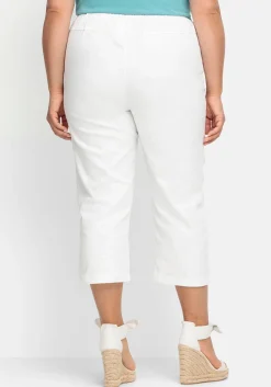 7/8-Jeans mit Zierknöpfen am Saum