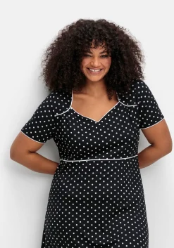 Jerseykleid mit Punktedruck und Paspelierung