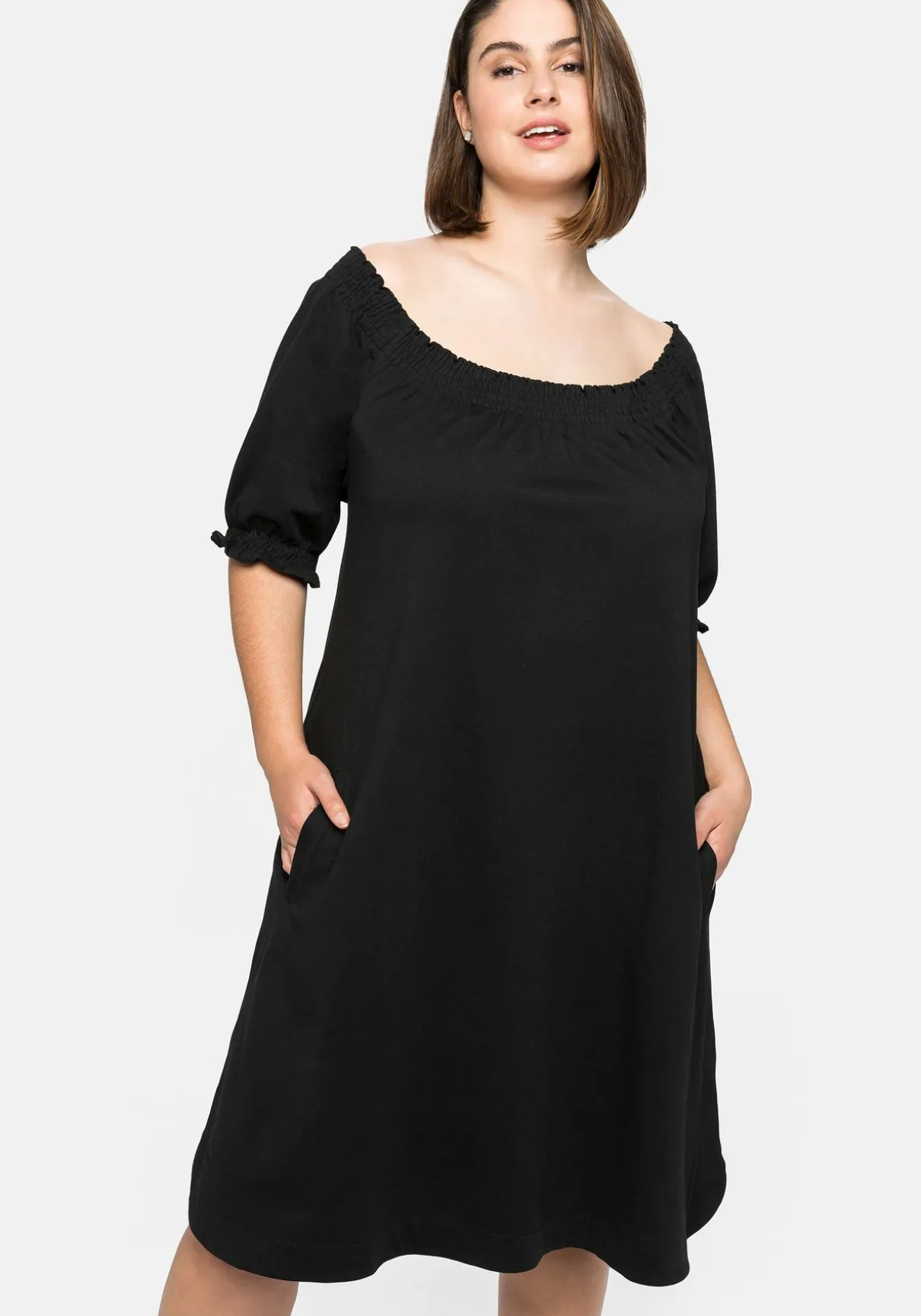 Jerseykleid mit Smok-Ausschnitt und Puffärmeln