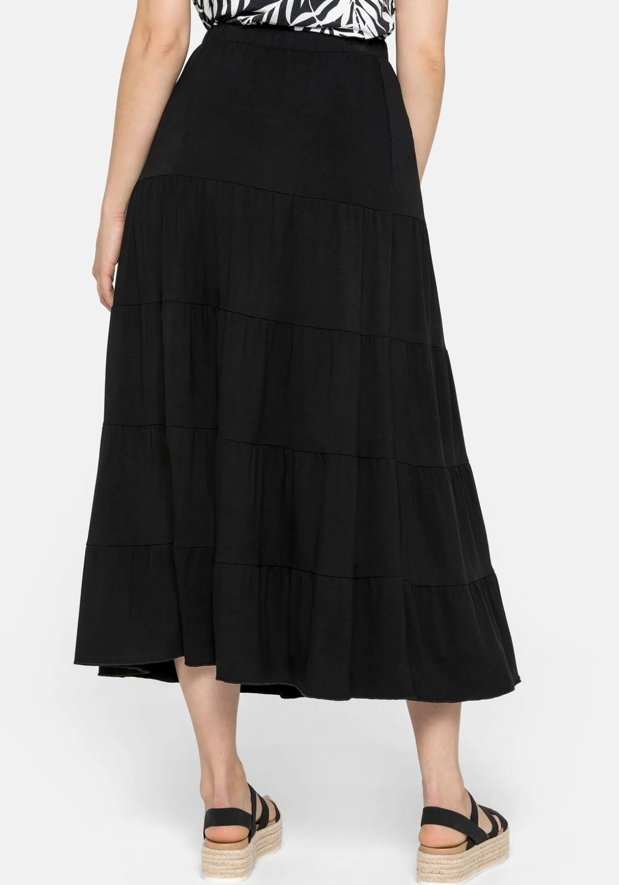 Jerseyrock in Maxilänge, mit stufigen Volants