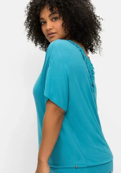 Jerseyshirt mit Einsatz aus Spitze im Nacken