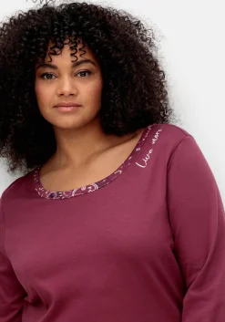 Langarmshirt mit Stickerei und Zierbändern hinten