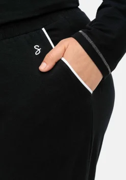 Lange Schlafhose mit schmalem Bein und Kontrastdetails