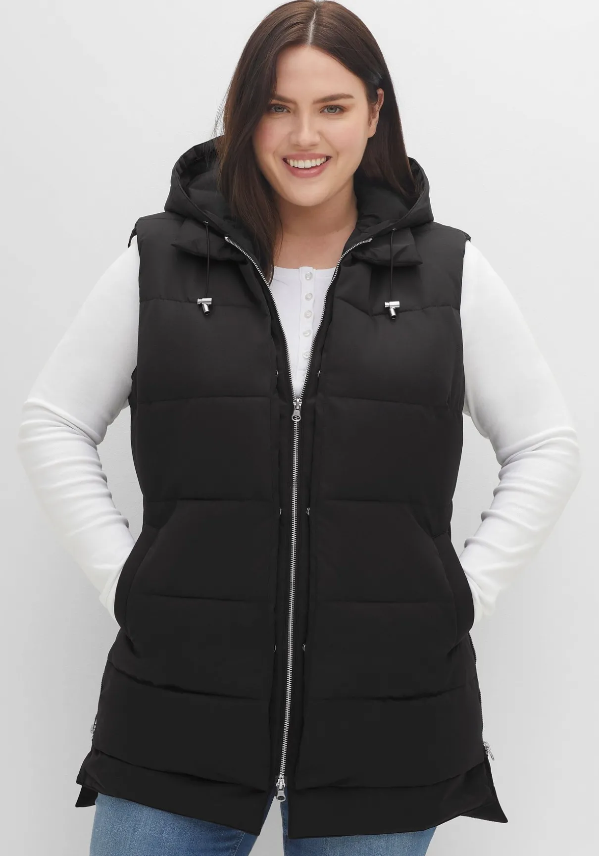 Lange Steppweste im Lagenlook, mit Kapuze