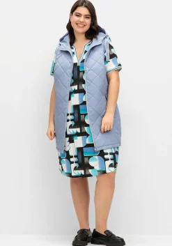 Lange Steppweste mit Kapuze und Kontrastdetails