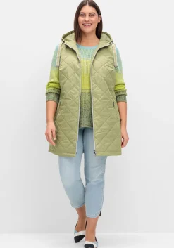 Lange Steppweste mit Kapuze und Kontrastdetails