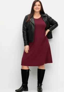 Lederstiefel mit Schnürung hinten und Zierschnalle