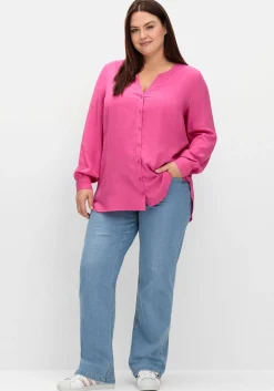 Longbluse mit tonigen Stickereien