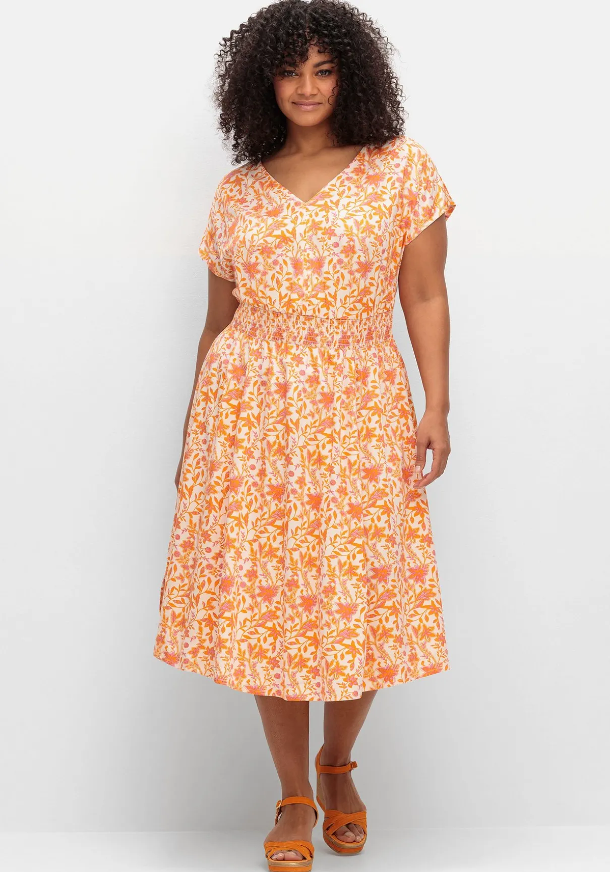 Midikleid mit Smokbund und weitem Rock