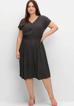 Midikleid mit Smokbund und weitem Rock