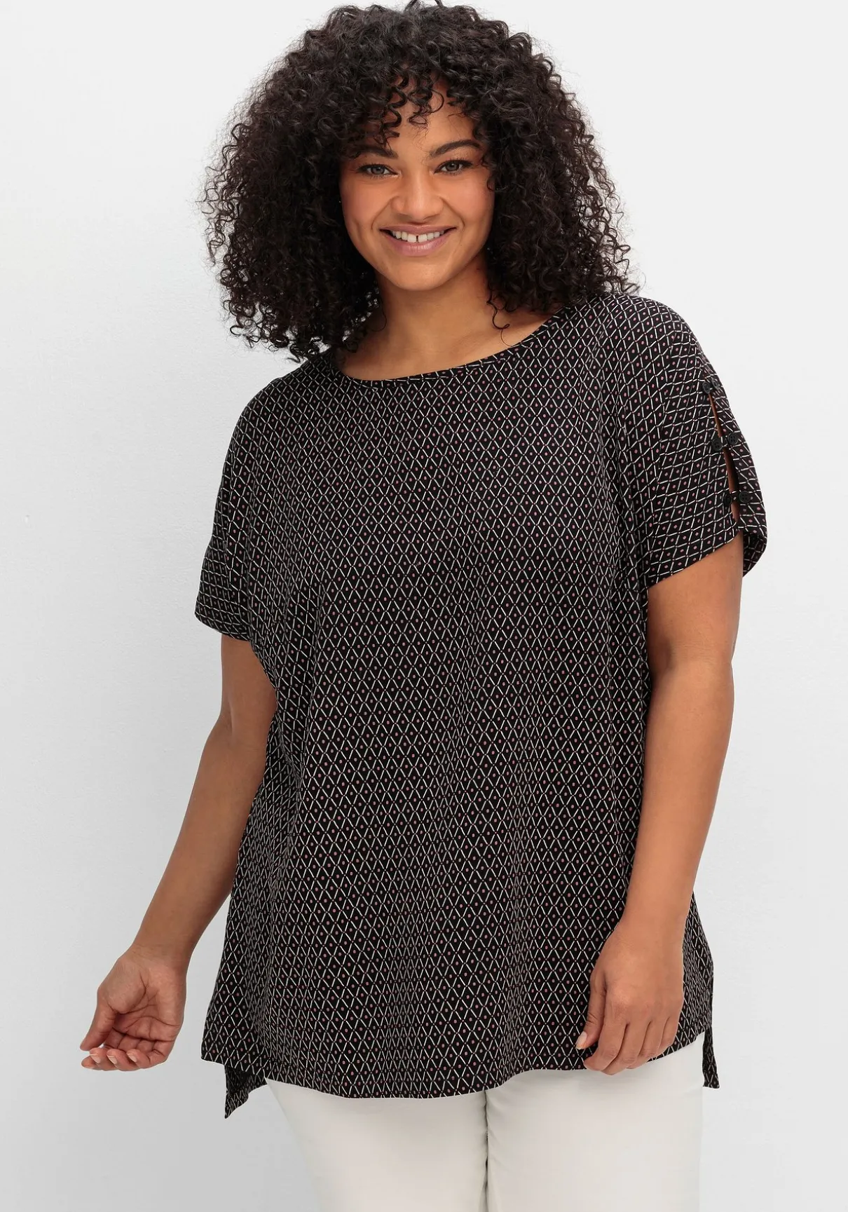 Oversize-Tunika mit Cut-outs an den Ärmeln