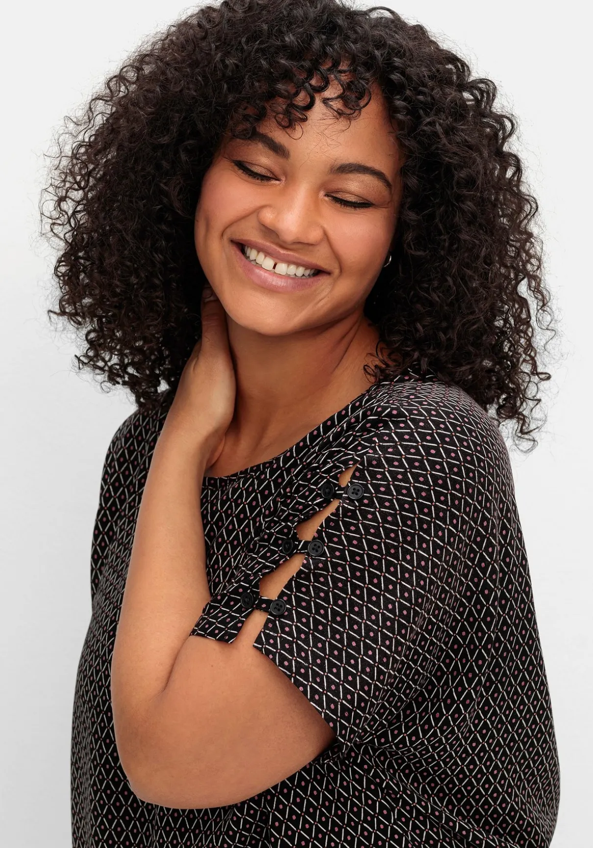 Oversize-Tunika mit Cut-outs an den Ärmeln