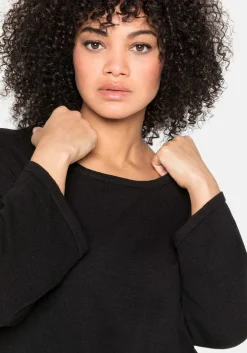 Pullover mit 7/8-Trompetenärmeln, aus Flammgarn