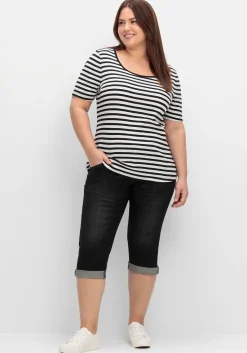 Schmale Caprijeans mit Used-Effekten