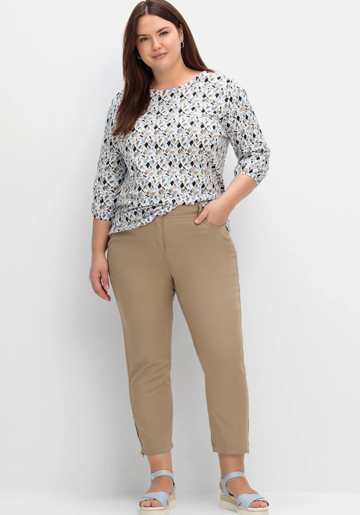 Schmale 7/8-Jeans mit Dehnbund und Zipper am Saum