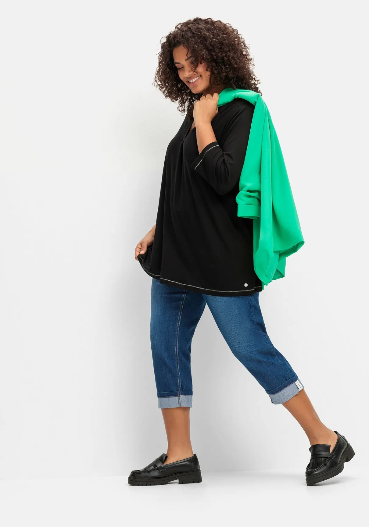 Schmale 7/8-Jeans mit Kontrasttape innen am Saum