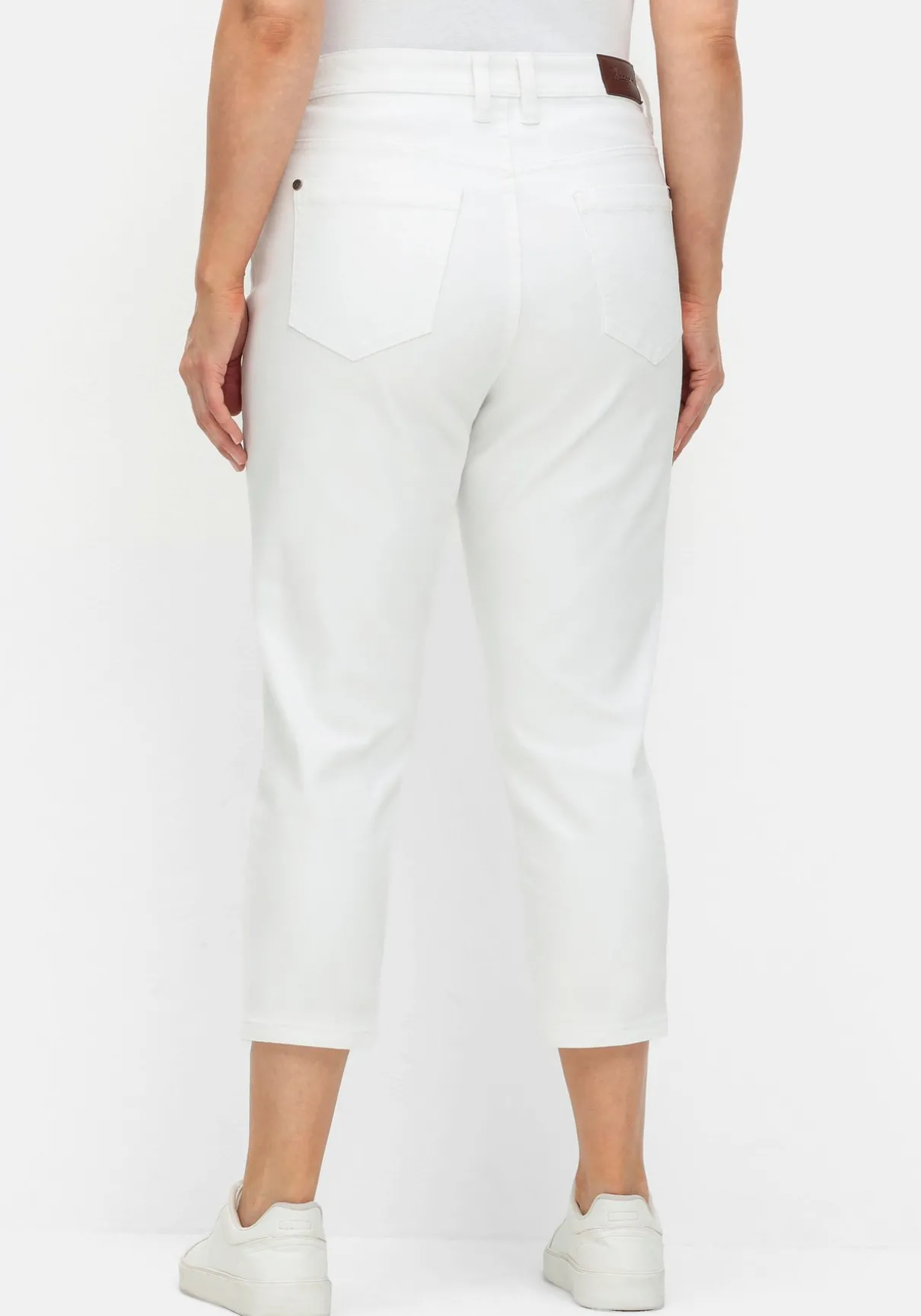 Schmale 7/8-Jeans mit Kontrasttape innen am Saum