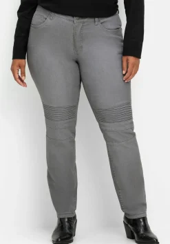 Schmale Jeans mit Ziernieten und Biesen