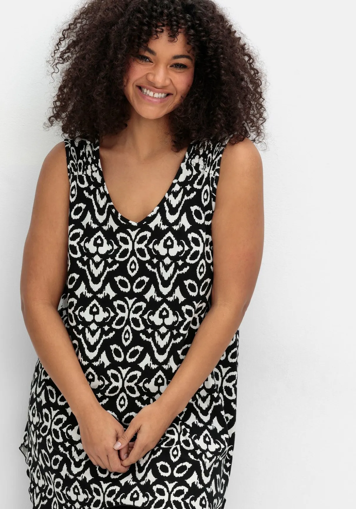 Set aus langem Zipfeltop und Leggings