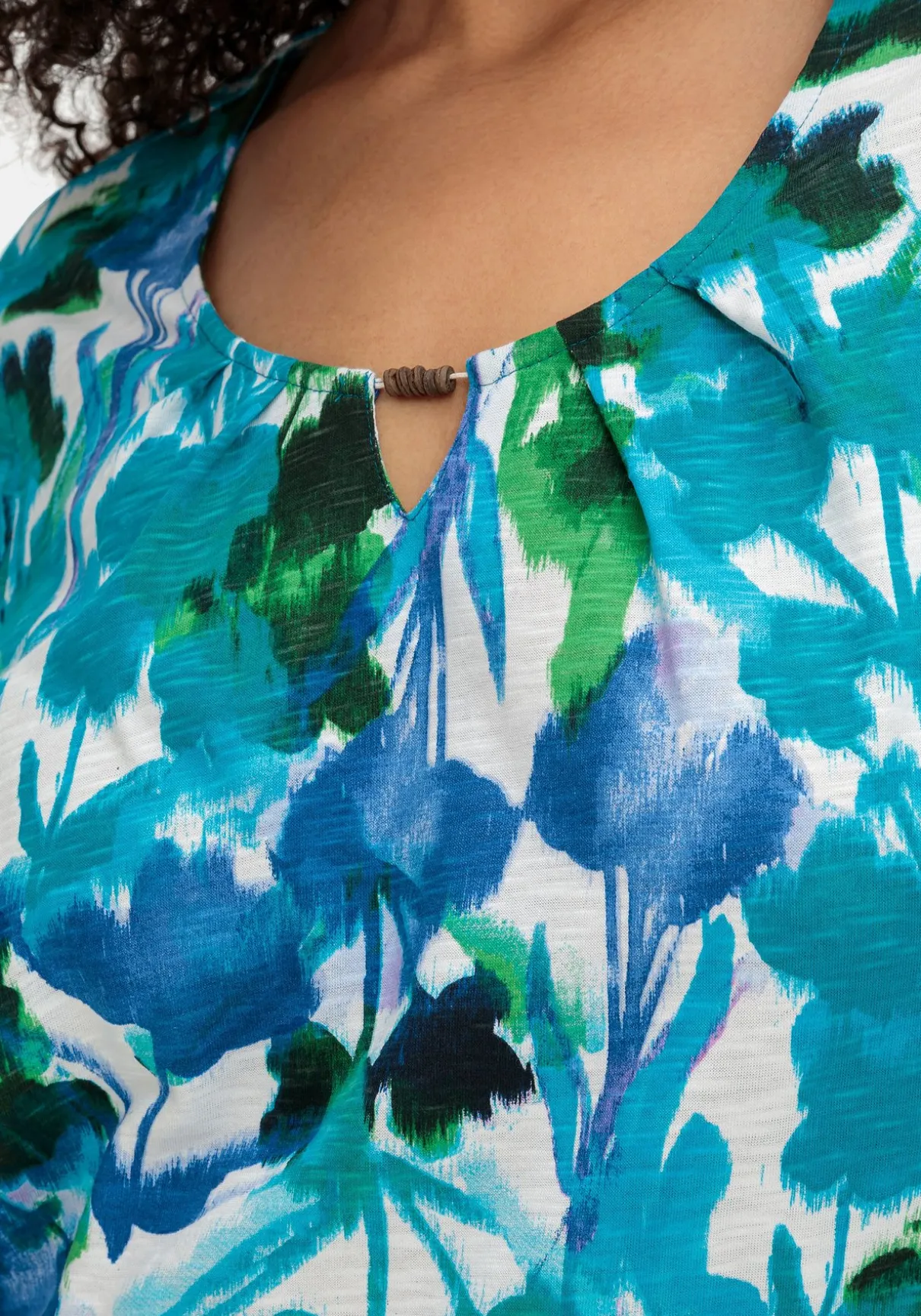 Shirt mit Blätterprint und Perlen-Detail