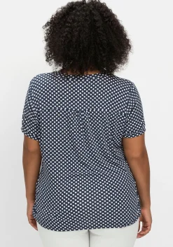 Shirt mit Pünktchen und Bindeband am Ausschnitt