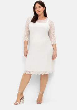 Spitzenkleid mit Wellensaum; knielang