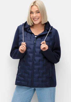 Steppjacke im Materialmix, mit Kapuze