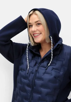 Steppjacke im Materialmix, mit Kapuze
