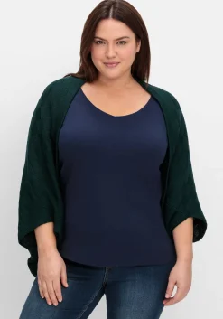 Strickcape im tonigen Schachbrettmuster