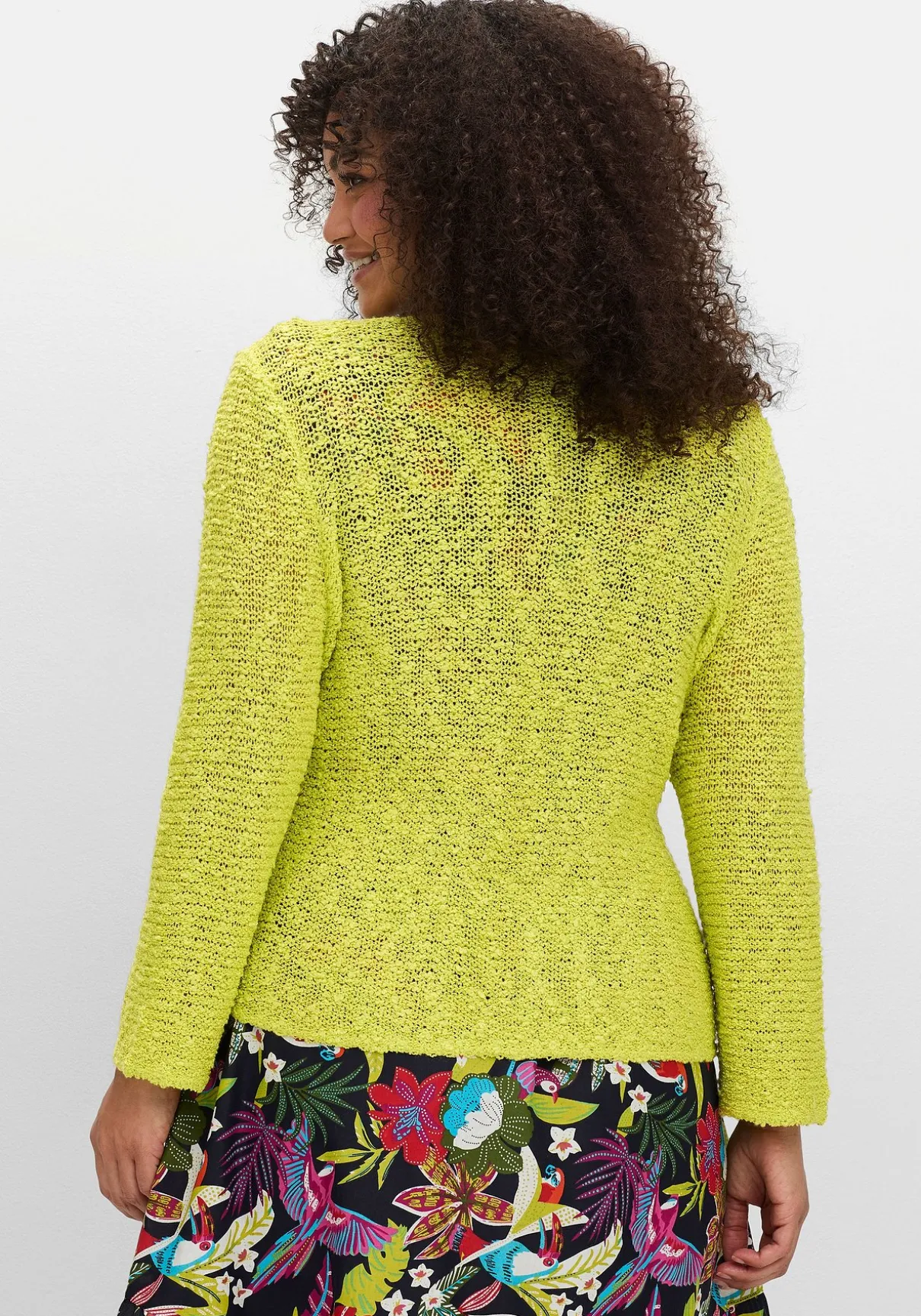 Strickjacke im Häkel-Look, mit zipfeligem Saum