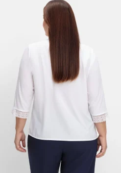 Tunika aus Crêpe, mit Spitzenbesatz