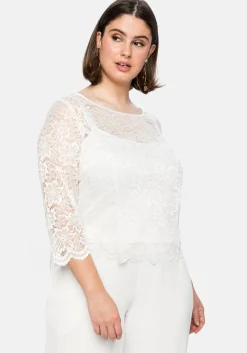 Tunika aus fein glänzender Spitze, mit Innentop