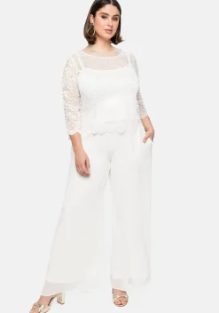 Tunika aus fein glänzender Spitze, mit Innentop