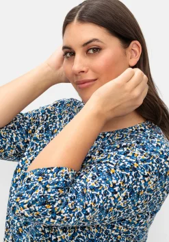 Tunika mit gelegten Falten und Minimalprint