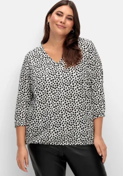 Tunika mit grafischem Alloverdruck