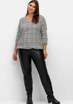 Tunika mit grafischem Alloverdruck