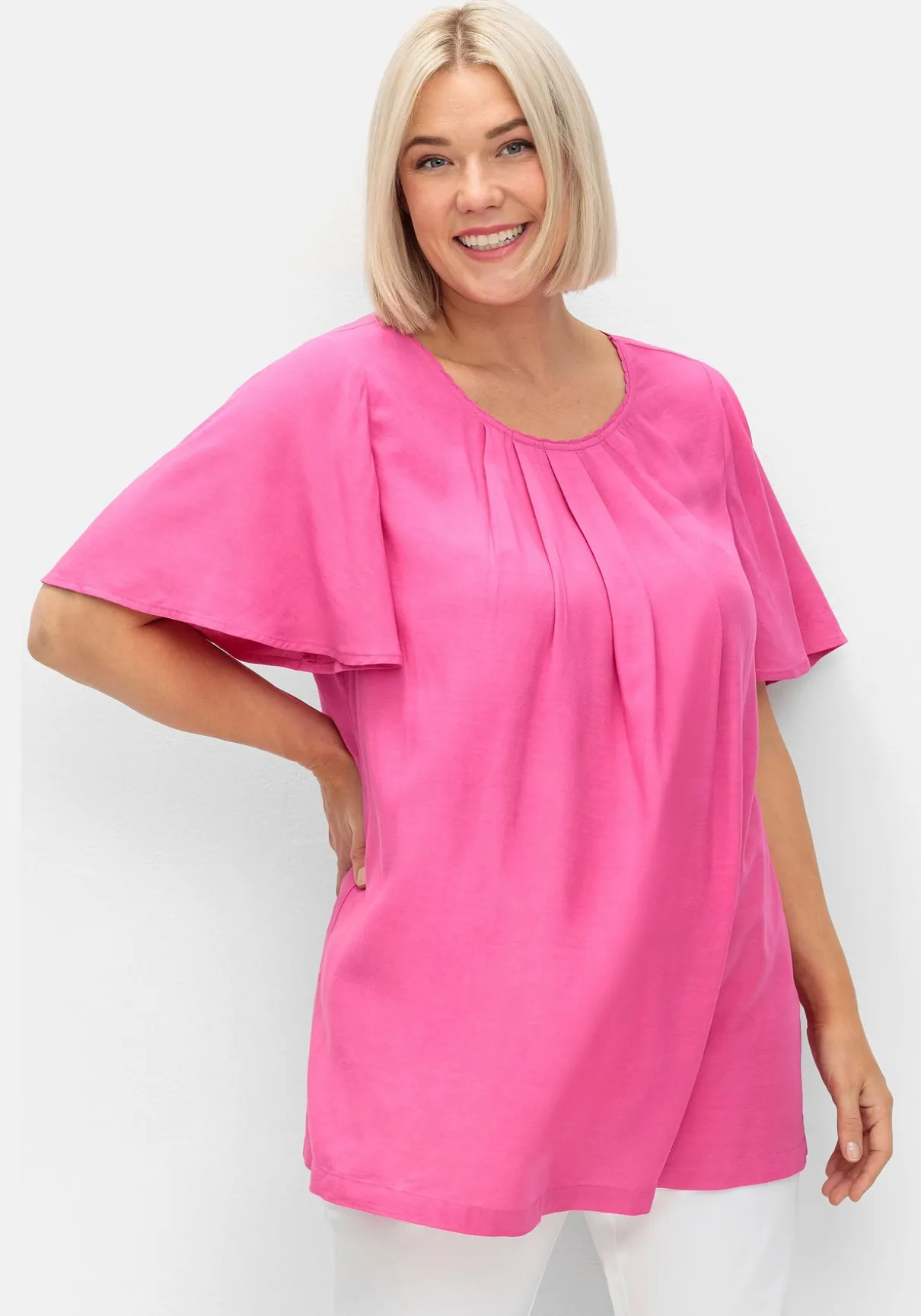 Tunika mit kurzen Flügelärmeln, in A-Linie